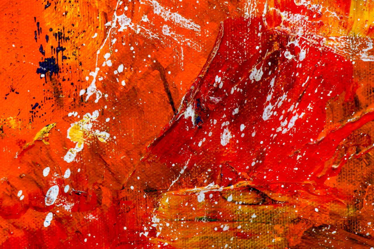 Bold abstract painting with vibrant red and orange tones, showcasing expressive brushstrokes and textures.